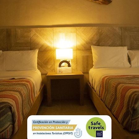 Hotel Puerto Corcho ปูแอร์โต โมเรลอส ภายนอก รูปภาพ