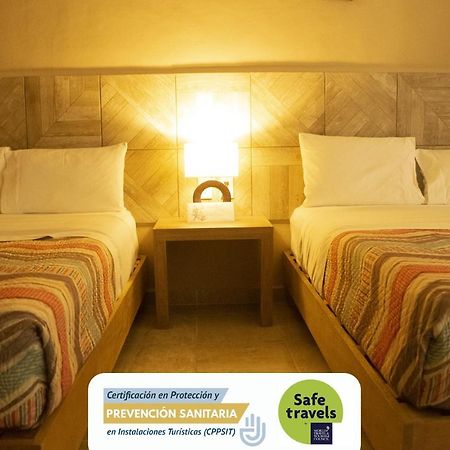 Hotel Puerto Corcho ปูแอร์โต โมเรลอส ภายนอก รูปภาพ
