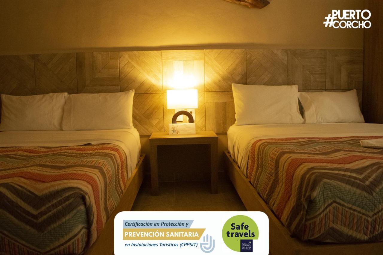 Hotel Puerto Corcho ปูแอร์โต โมเรลอส ภายนอก รูปภาพ