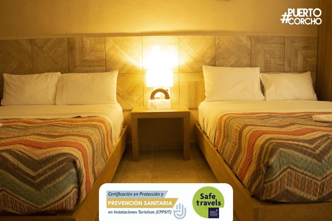 Hotel Puerto Corcho ปูแอร์โต โมเรลอส ภายนอก รูปภาพ