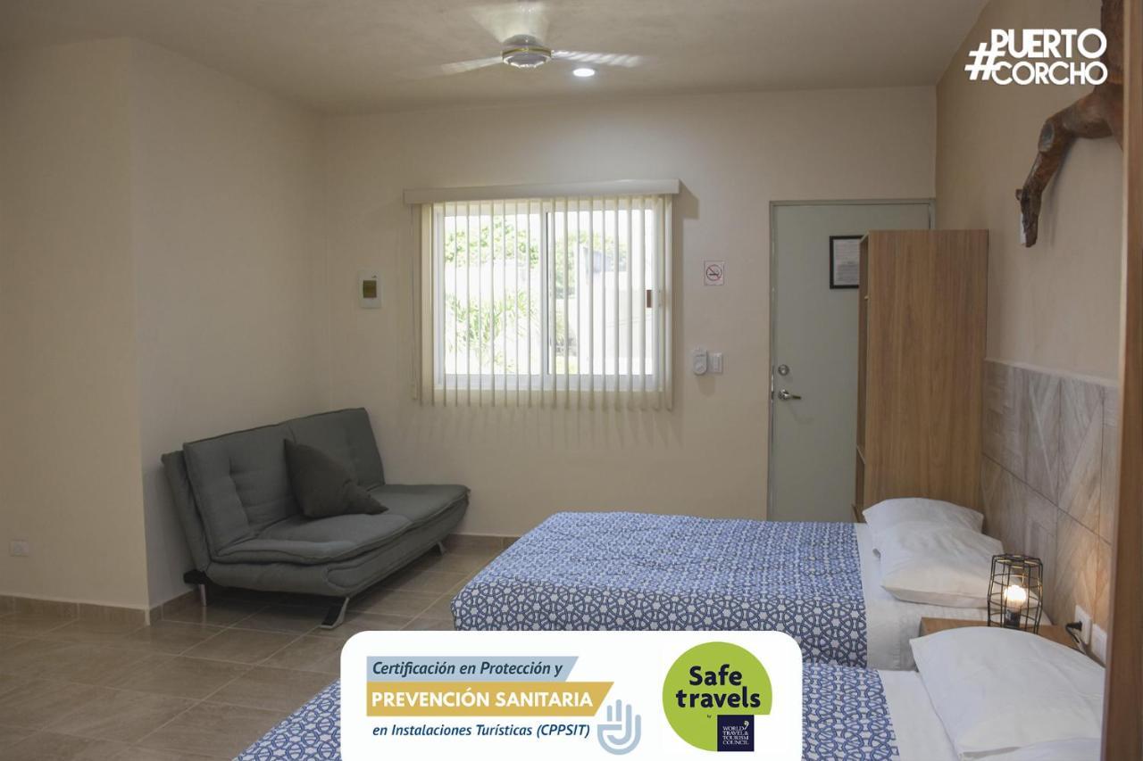 Hotel Puerto Corcho ปูแอร์โต โมเรลอส ภายนอก รูปภาพ