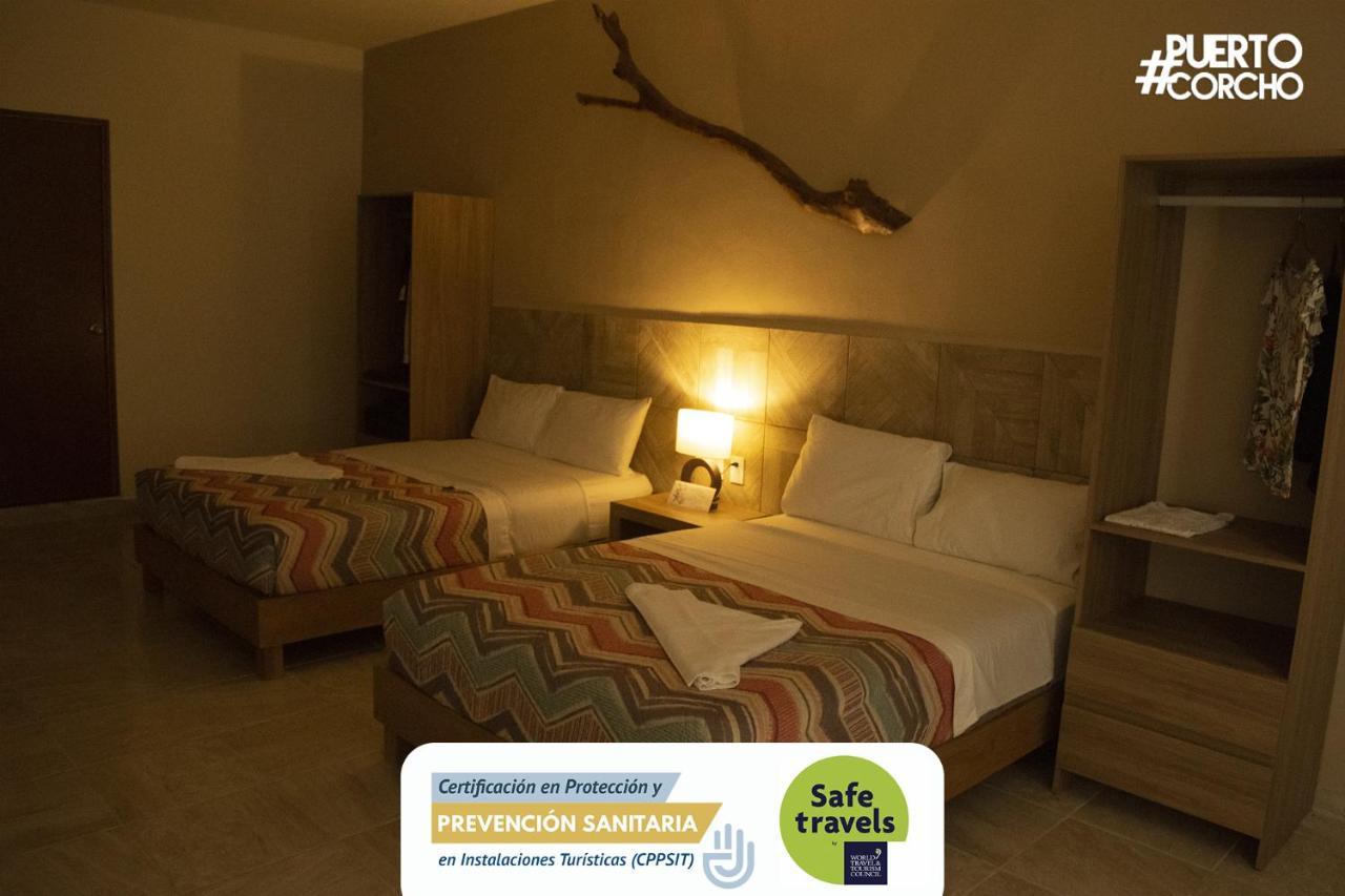 Hotel Puerto Corcho ปูแอร์โต โมเรลอส ภายนอก รูปภาพ