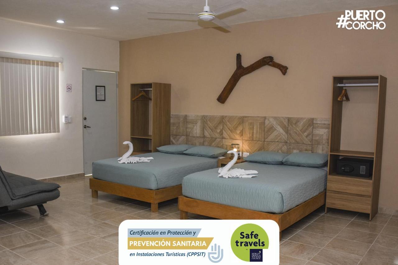 Hotel Puerto Corcho ปูแอร์โต โมเรลอส ภายนอก รูปภาพ